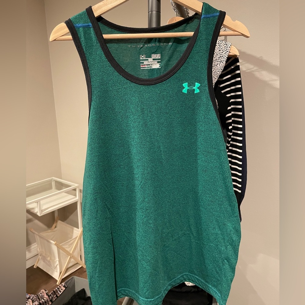 Gently used Men’s M Under Armour Heatgear tank top.